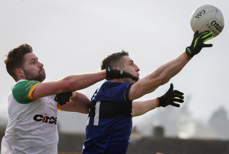 Kerry’s Paul Geaney and Brendan McCole of Donegal compete for possession in the air. Photograph: Lorraine O’Sullivan/Inpho