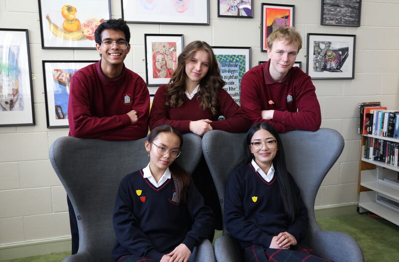 Students Nathan Silveira, Amelia Lupascu and Alex Cunningham, standing, and twin sisters Ailish and Aislinn Facto, seated. Photograph: Bryan O’Brien
