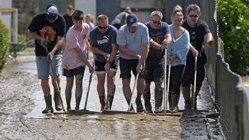 Residents in Taradale clean up silt following flood waters on February 15th in Napier, New Zealand. Photograph: Kerry Marshall/Getty Images