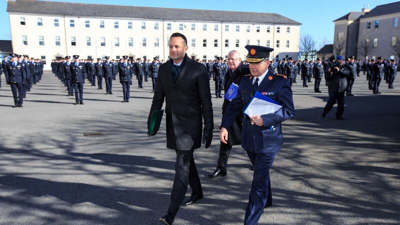 Taoiseach Leo Varadkar, Minister for Justice Charlie Flanagan  and Garda Commissioner Drew Harris during an attestation ceremony at the Garda Training College in Templemore, Co Tipperary on Friday. Photograph: Mark Condren/PA Wire.