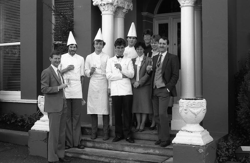 Brothers Declan, left, and Michael Ryan, right, with staff