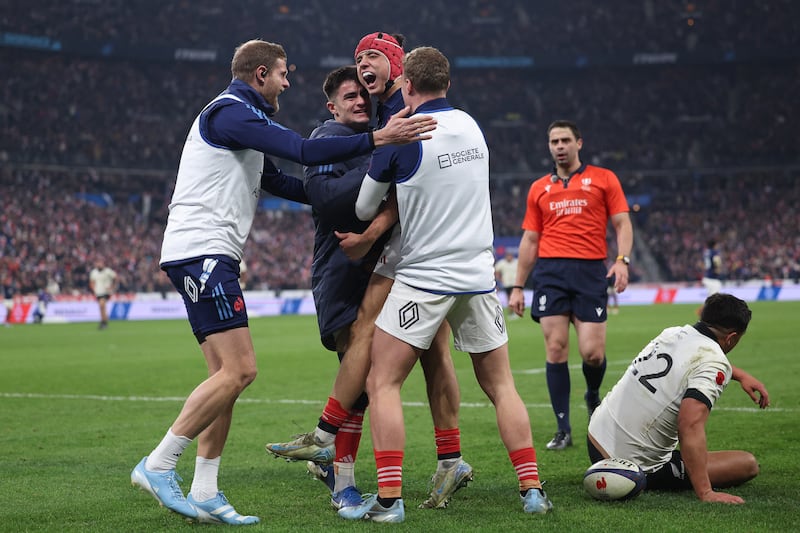 France winger Louis Bielle-Biarrey celebrates with team-mates after scoring his side's third try at Stade de France. Photograph: Franck Fife/AFP via Getty Images