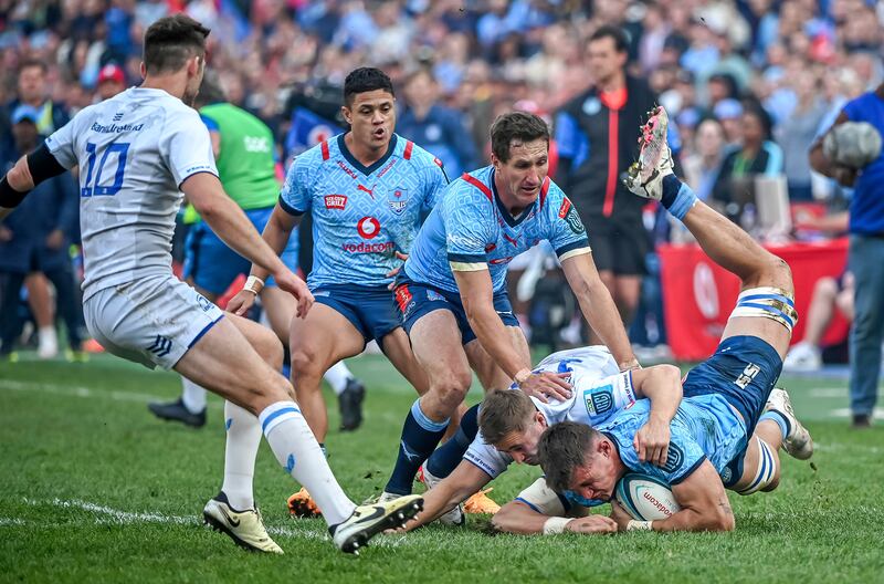 Leinster's Jordan Larmour and Elrigh Louw of the Bulls compete for possession. Photograph: Deon van der Merwe /Steve Haag Sports/Inpho