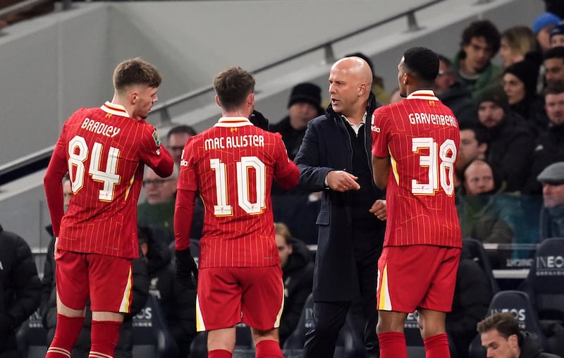 Liverpool manager Arne Slot with Conor Bradley, Alexis Mac Allister and Ryan Gravenberch during the Carabao Cup semi-final first leg match against Tottenham Hotspur. Photograph: Adam Davy/PA