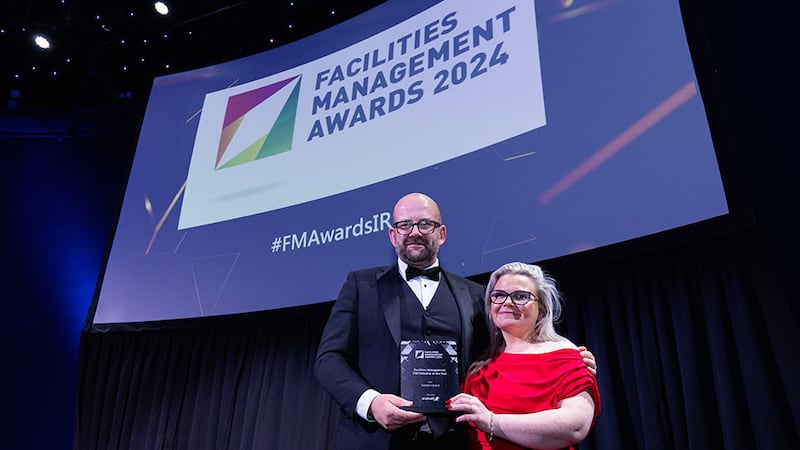 Jason Keegan, managing director of Aramark Ireland, presents the facilities management CSR initiative of the year award to Marian Cronin, Sodexo Ireland