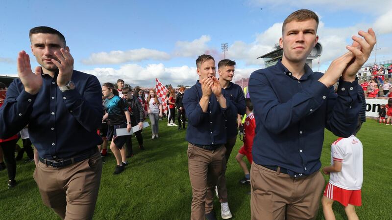 Tyrone players greet fans at Healy Park. Photograph: Pacemaker