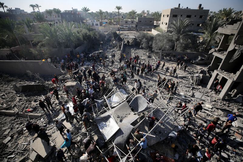 Palestinians search rubble for survivors following Israeli strikes on al-Maghazi refugee camp in the central Gaza Strip on Monday. Photograph: AFP via Getty Images