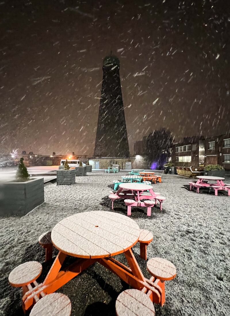 Snow falling on the Old Windmill in Dublin last night. Photograph: Sasko Lazarov/RollingNews.ie