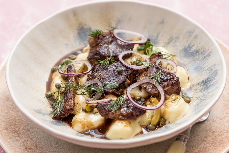 Gnocchi with slow roasted lamb, creme fraiche and greens. Photograph: Harry Weir 