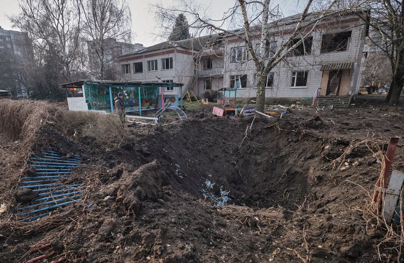 A shell crater near a damaged kindergarten in Kramatorsk, Donetsk region, eastern Ukraine, January 20th, 2023, amid Russia's invasion. Photograph: Yevgen Honcharenko/EPA