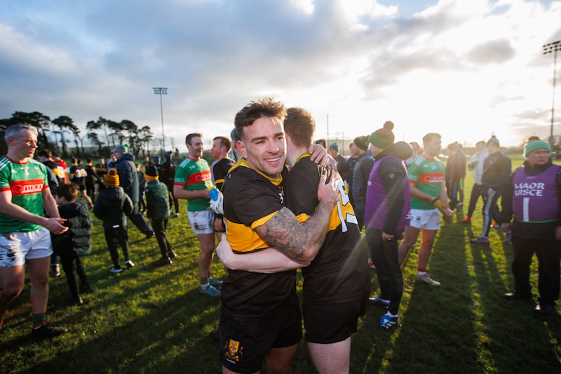 
Dr Crokes' Micheal Burns and Cian McMahon celebrate winning the Munster senior football club championship final against Loughmore-Castleiney in Mallow, Co Cork, on December 8th, 2024. Photograph: Tom Maher/Inpho