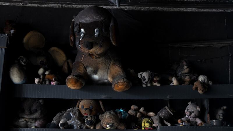 Charred stuffed toys in a child’s bedroom in a building that was destroyed in a bombing in Trostyanets. Photograph: Tyler Hicks/New York Times