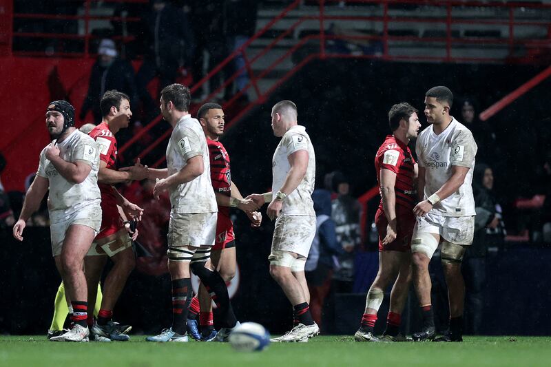 Toulouse and Ulster players shake hands after the pitifully one-sided clash at Stade Ernest Wallon, Toulouse. Photograph: Laszlo Geczo/Inpho 