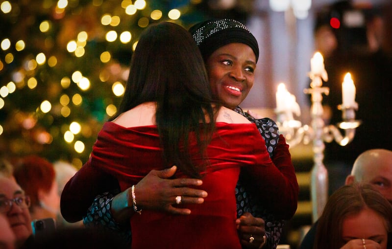 Kellie Harrington hugs Adewumi Ademola, mother of Rhasidat Adeleke, at the Irish Times Sportswoman of the Year 2024 awards ceremony. Photograph: Tom Maher/Inpho