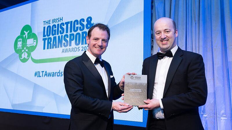 Seamus Kavanagh, Awards Judge, presents the Freight Forwarding Company of the Year award to Eamon Galavan, Ace Express Freight.