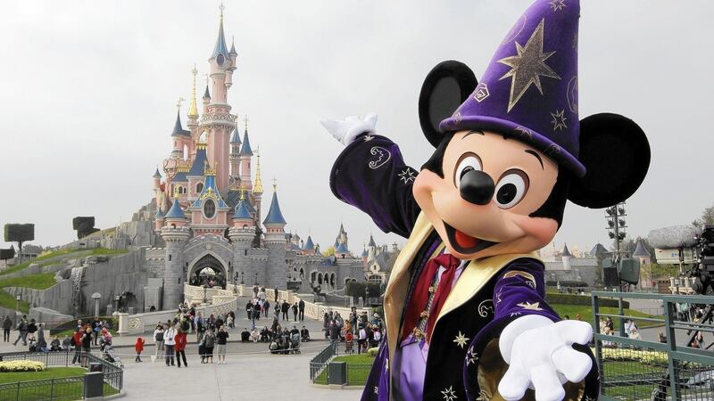 More recent iterations of Mickey Mouse remain protected - for now. Above, Mickey Mouse at the Sleeping Beauty Castle at Disneyland Paris. Photograph: Thomas Samson/AFP/Getty 