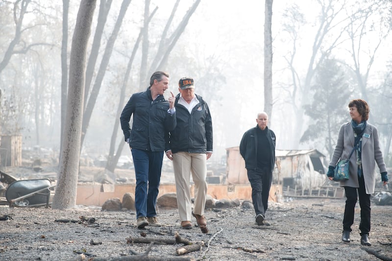 
Donald Trump speaks with Gavin Newsom as they toured Paradise, California, following a fire in 2018. Photograph: Tom Brenner/New York Times
                      