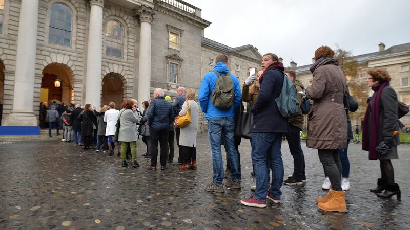 A queue for the memorial service and celebration of the life of John Curran who was killed in Cape Town, South Africa, on November 6th. Photograph: Alan Betson / The Irish Times