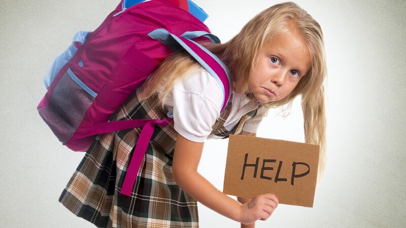 A study found that almost one in three primary school children’s bags weigh so much that the kids struggle to walk to school with the things on their backs. Photograph: iStock