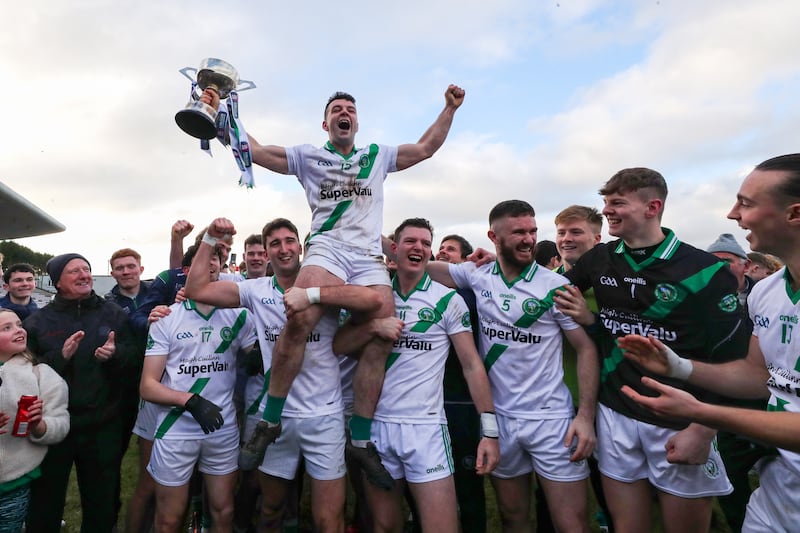 Moycullen's Dessie Conneely and teammates celebrate after winning the Connacht Senior Club Football Championship. Photograph: INPHO/Bryan Keane