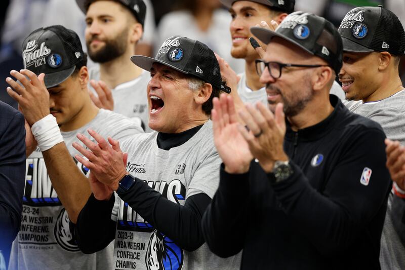 Dallas Mavericks owner Mark Cuban and head coach Jason Kidd celebrate after a victory against the Minnesota Timberwolves in Minneapolis, Minnesota. Photograph: David Berding/Getty Images 