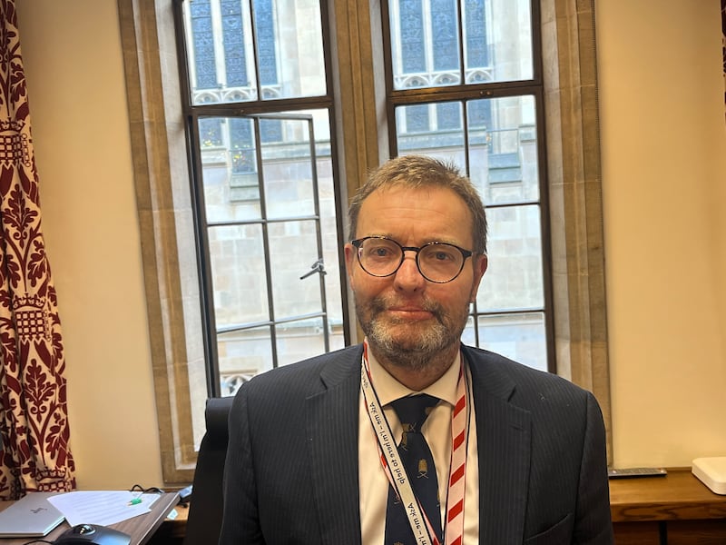 Craig Mackinlay pictured in his office in the House of Lords just before Christmas. He lost all four limbs to sepsis a year ago and became known as the Bionic MP while in the House of Commons