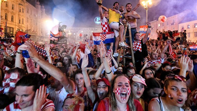 Supporters of Croatian national football team celebrate during the team welcoming ceremony at the Bana Jelacica Square in Zagreb on July 16th. Photograph: Dimitar Dilkoff/AFP/Getty Images