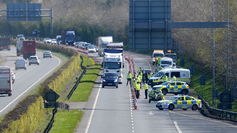 A large tailback ahead of a Garda checkpoint on the M4 near Celbridge, Co Kildare. Despite isolated incidents, public compliance with draconian Covid-19 legislation remains extremely high. Photograph: Alan Betson/The Irish Times