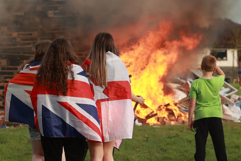 Children gather at the Craigyhill bonfire in Larne. Photograph: Liam McBurney