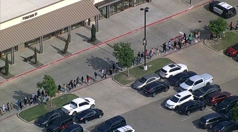 Officials received reports of gunshots from the Allen Premium Outlets at about 3.40pm. Photograph: WFAA/AP