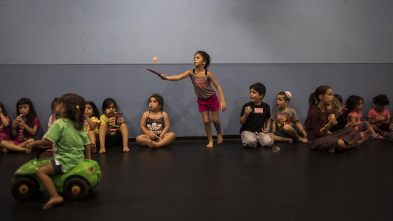 Israeli children in a special bomb shelter playground in the city of Sderot yesterday. Photoograph: Ilia Yefimovich/Getty Images