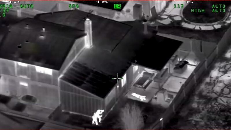 In this screen grab taken on March 30, 2018, from a helicopter police camera video released by the Sacramento Police Department, police are seen shooting at Stephon Clark (R) in the garden  of his grandmother’s house: Photograph: Handout/AFP