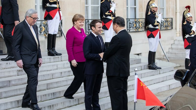 French president Emmanuel Macron welcomes Chinese president Xi Jinping at the Élysée Palace in Paris. Photograph: Christophe Morin/Bloomberg