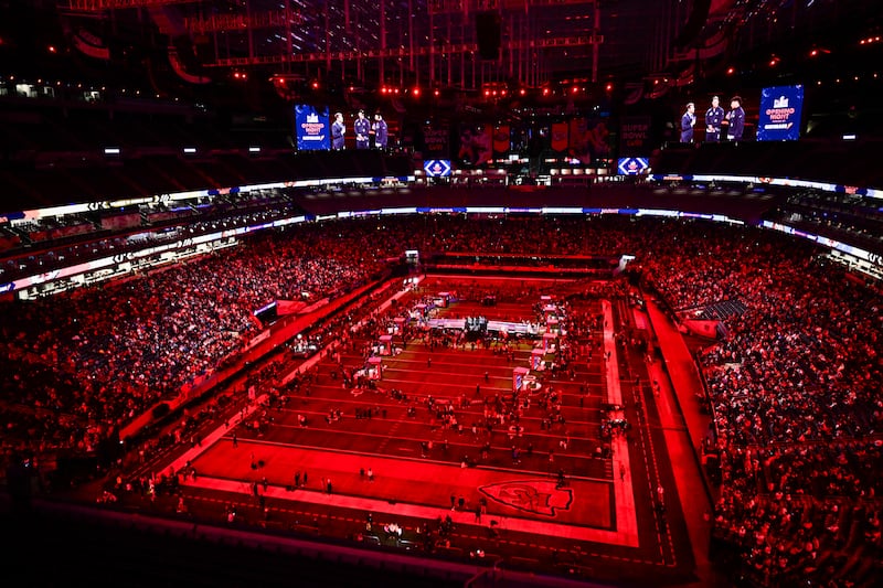 Fans cheer as Kansas City Chiefs quarterback Patrick Mahomes speaks during Super Bowl LVIII Opening Night at Allegiant Stadium in Las Vegas, Nevada on Monday. Photograph: Patrick T. Fallon/AFP via Getty Images