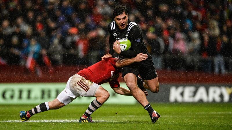 Lowe goes past Duncan Williams of Munster during the clash at Thomond Park in 2016. Photo: Diarmuid Greene/Sportsfile via Getty Images