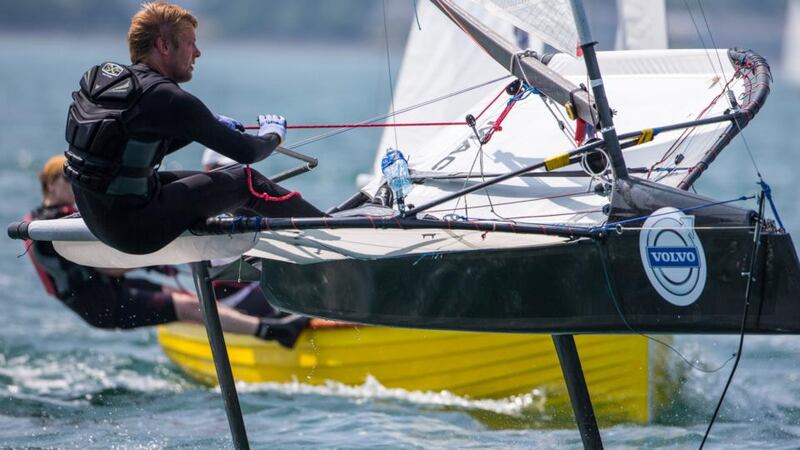 Dún Laoghaire’s John Chambers competing on his foiling-type Moth dinghy on the second day of racing at the Volvo Dún Laoghaire Regatta off Seapoint yesterday. Photograph: David Branigan/Oceansport