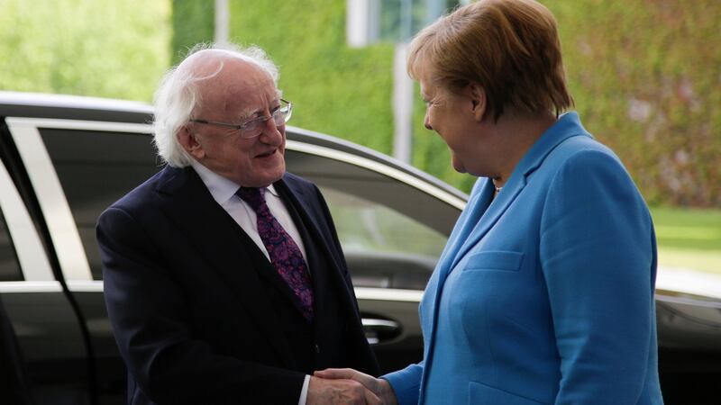 German chancellor Angela Merkel welcomes  President Michael D Higgins in Berlin. Photograph: Markus Schreiber/AP