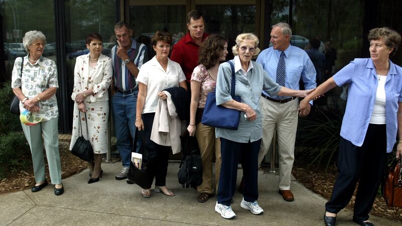 Family and friends of Lynette Dawson leave court after an inquest in Westmead, Sydney, in  2003. Photograph: Sean Davey/Fairfax Media via Getty Images