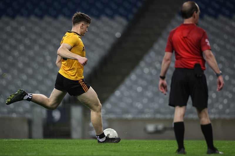 Ulster's Odhrán Murdock scores  the winning penalty. Photograph: Ben Brady/Inpho