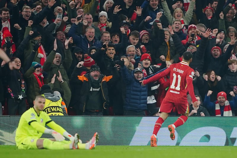 Mohamed Salah celebrates scoring Liverpool's first goal. Photograph: Peter Byrne/PA