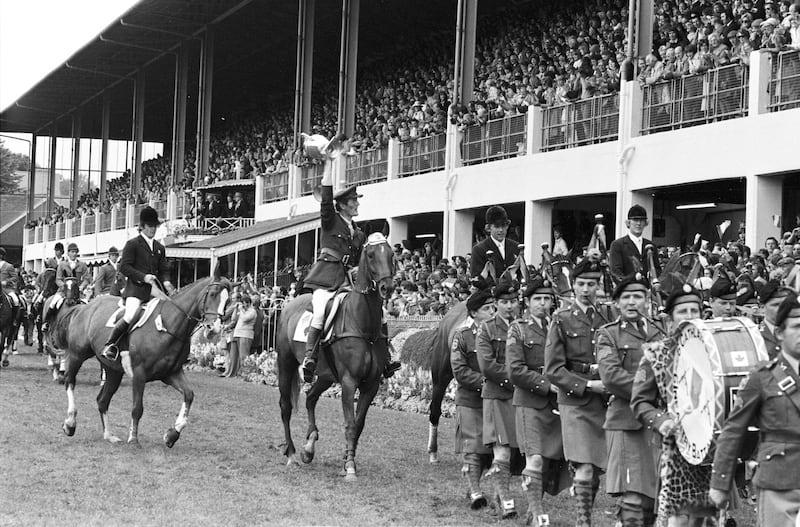 Captain Con Power holding aloft the Aga Khan Trophy during a lap of honour with his team-mates Paul Darragh, James Kernan and Eddie Macken after the Irish team had completed a hat-trick in the competition at the RDS, Ballsbridge, in August 1979. Photograph: Tom Lawlor 