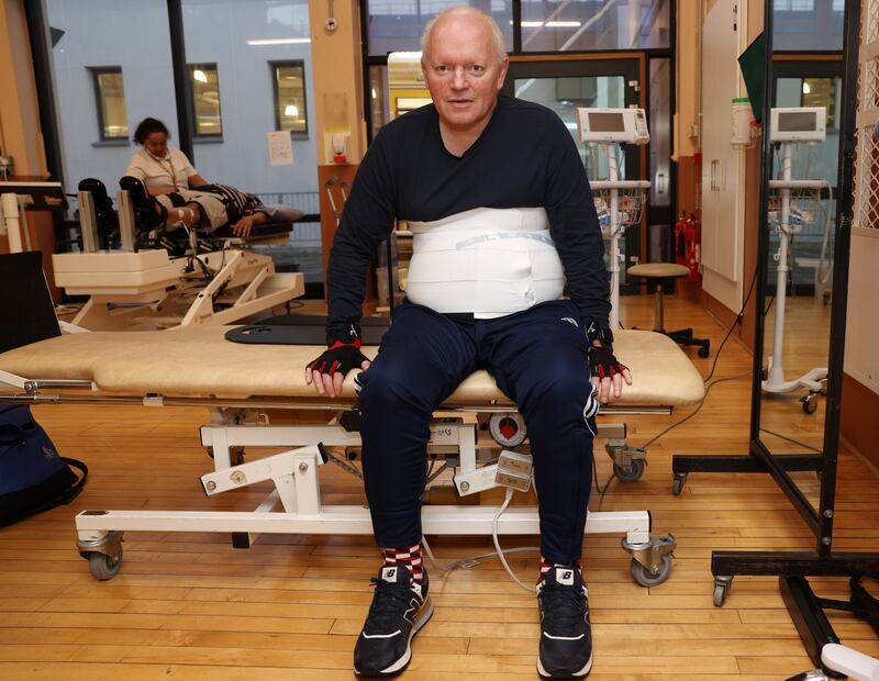 Myles O'Brien prepares to use the tilt table in the National Rehabilition Hospital in Dún Laoghaire. Photograph: Laura Hutton