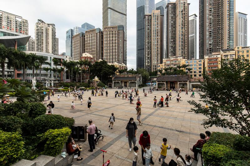 Children playing Xiasha Village: Raising a child to the age of 18 is more expensive in China than almost anywhere in the world. Photograph: Qilai Shen/New York Times