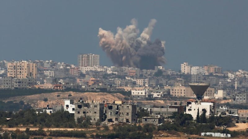 Smoke rises in the Gaza Strip after an Israeli strike today. Photograph: Amir Cohen/Reuters