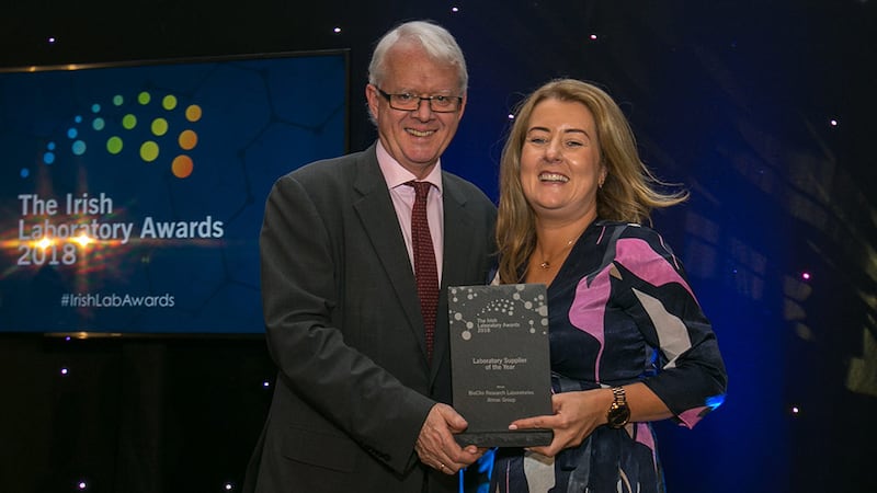 Matt Moran, Director, BioPharmaChem Ireland, presents the Laboratory Supplier of the Year award to Roisin Browne, BioClin Research Laboratories - Almac Group.