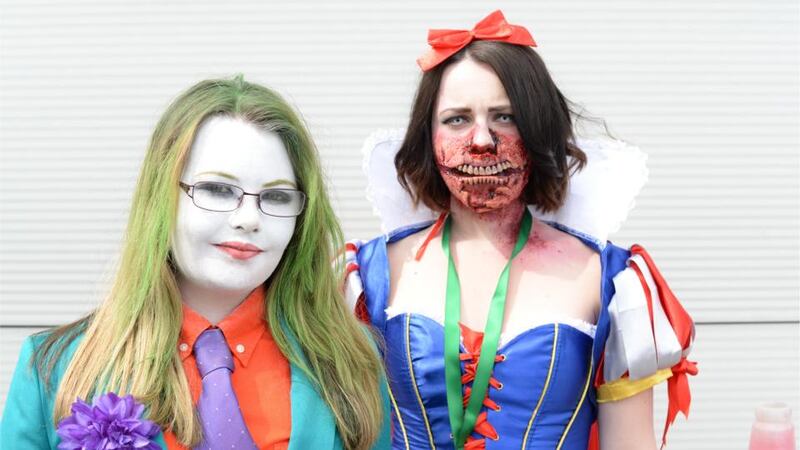 Sisters Nicole (left, dressed as Girl Joker) and Sarah Reddin (dressed as Zombie Snow White), from Swords, at Dublin Comic Con. Photograph: Dara Mac Dónaill. See more portraits from Dublin Comic Con in the online gallery at irishtimes.com