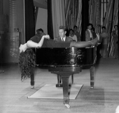 John Cage and Yoko Ono performing Cage’s Music Walk in Tokyo in 1962. Photograph: Yasuhiro Yoshioka/Sogetsu Foundation via The New York Times