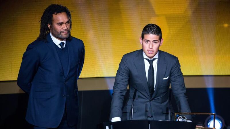 Fifa Puskas Award winner James Rodriguez of Colombia and Real Madrid speaks next to Christian Karembeu of France during the FIFA Ballon d’Or Gala 2014 at the Kongresshaus  in Zurich, Switzerland. Photograph:   Philipp Schmidli/Getty Images