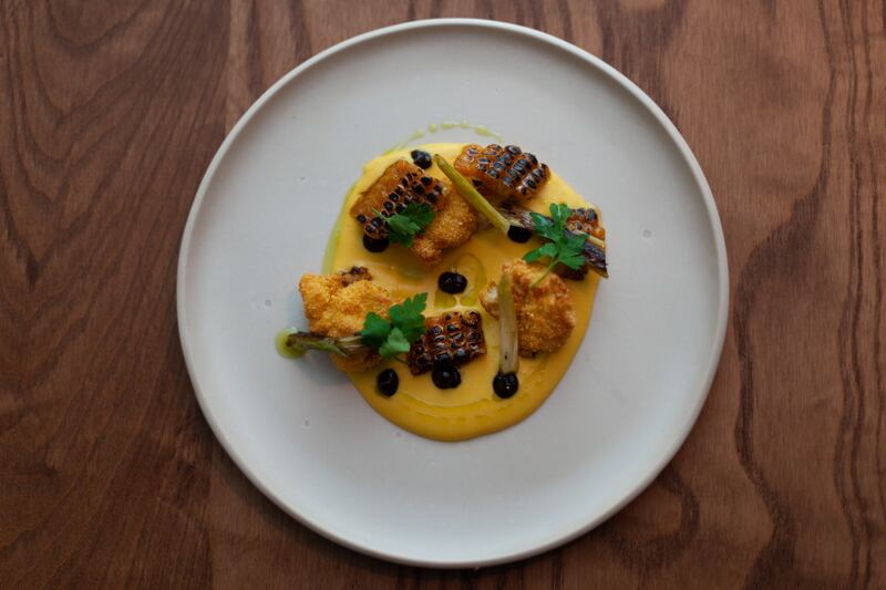 Neighbourhood: sweetbreads with charred corn and onion