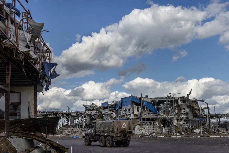 A Ukrainian army vehicle passes through the destroyed Russian border post at the Sudzha crossing with Ukraine in Kursk region of Russia in August. Photograph: David Guttenfelder/The New York Times